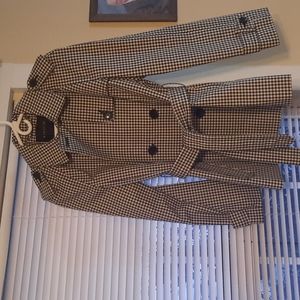 Womens Coach Trench coat. Size large. Black and white